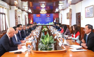 Vietnam, Laos step up Party-building cooperation